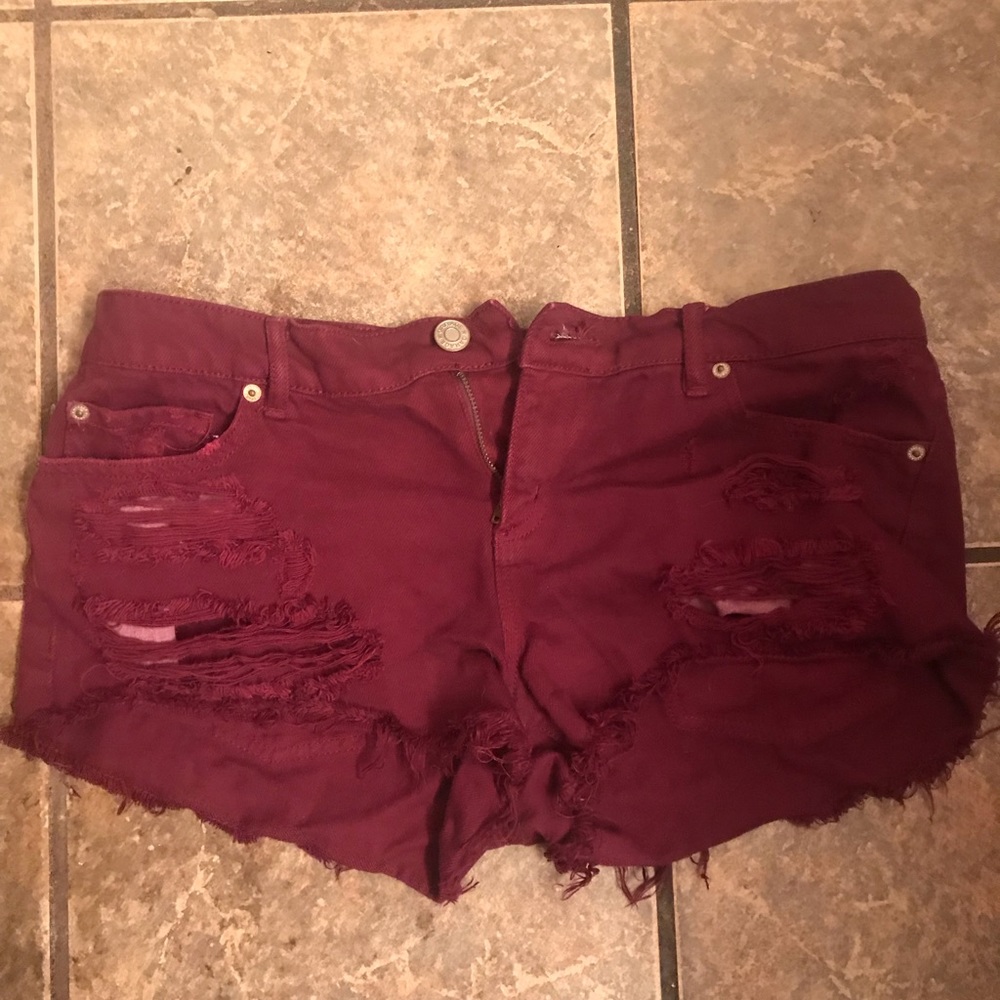 Maroon ripped shorts